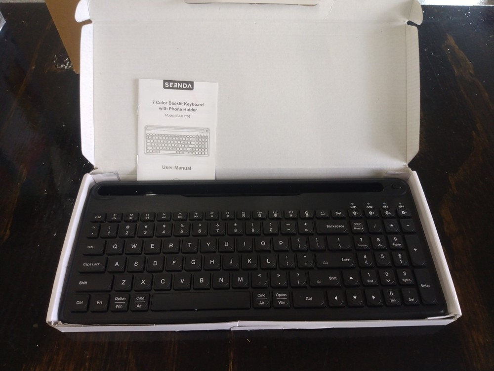 7-Color Backlit Bluetooth Keyboard with Phone Stand - Rechargeable Full-Size Wireless