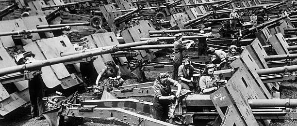 Women of the Auxiliary Territorial Service work at waterproofing A- Old Photo