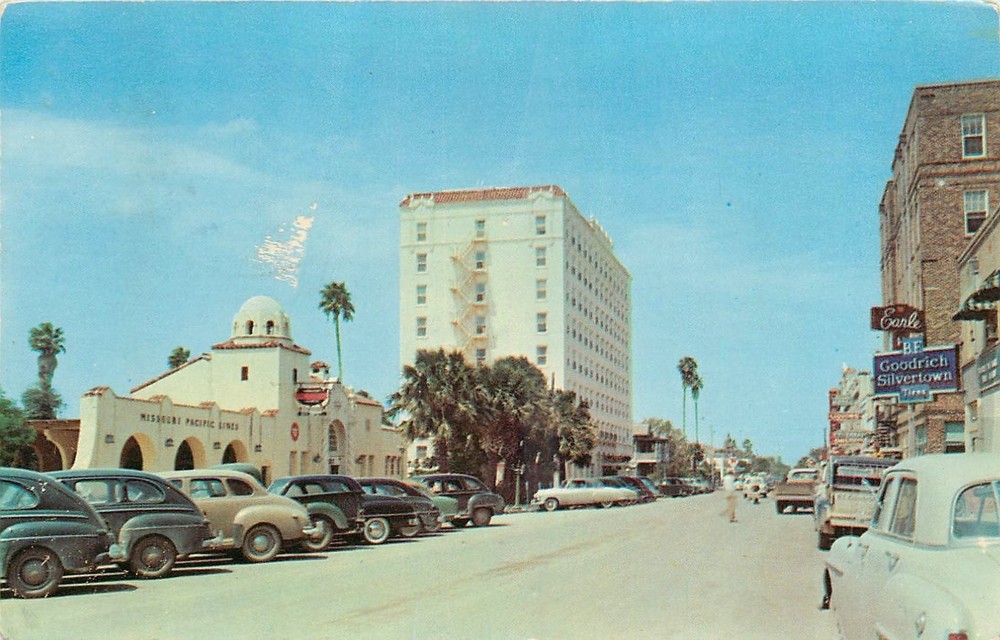 1952 Brownsville Texas Downtown Levee Streets autos occupation Postcard 25-8661