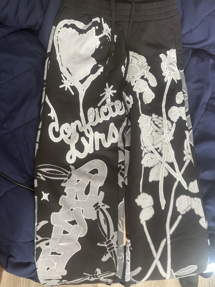 Conflicted Lovers Distressed Denim Pants  