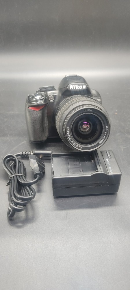 Nikon D3100 14.2MP DSLR Camera w/ AF-S Nikkor DX 18-55mm 3.5-5.6G Lens