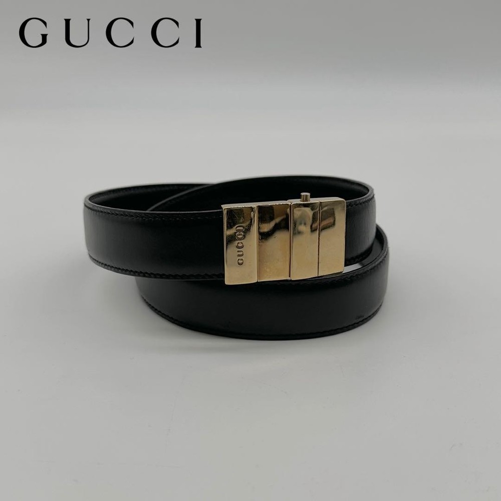 GUCCI unisex black leather belt with gold logo plate hardware authentic Made in Italy