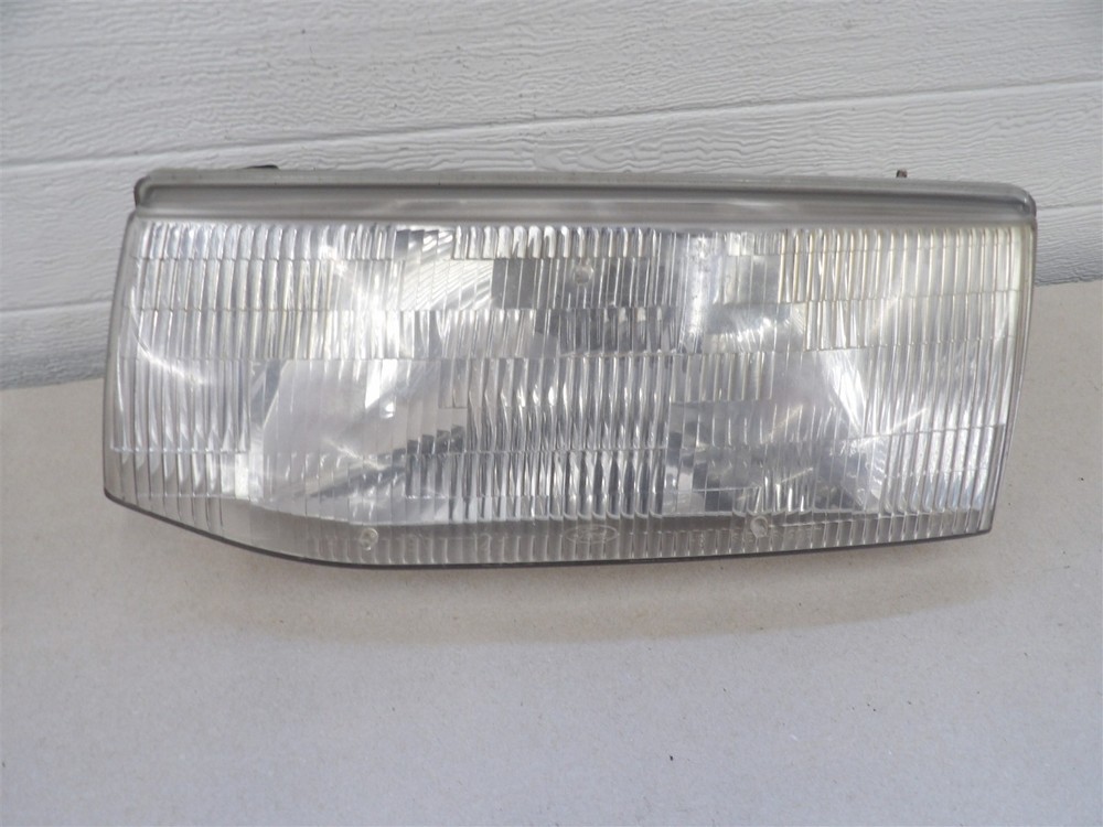 FORD ESCORT 1991-1996 LH LEFT DRIVERS SIDE HEADLIGHT LAMP CAPSULE -SHIPS FAST!