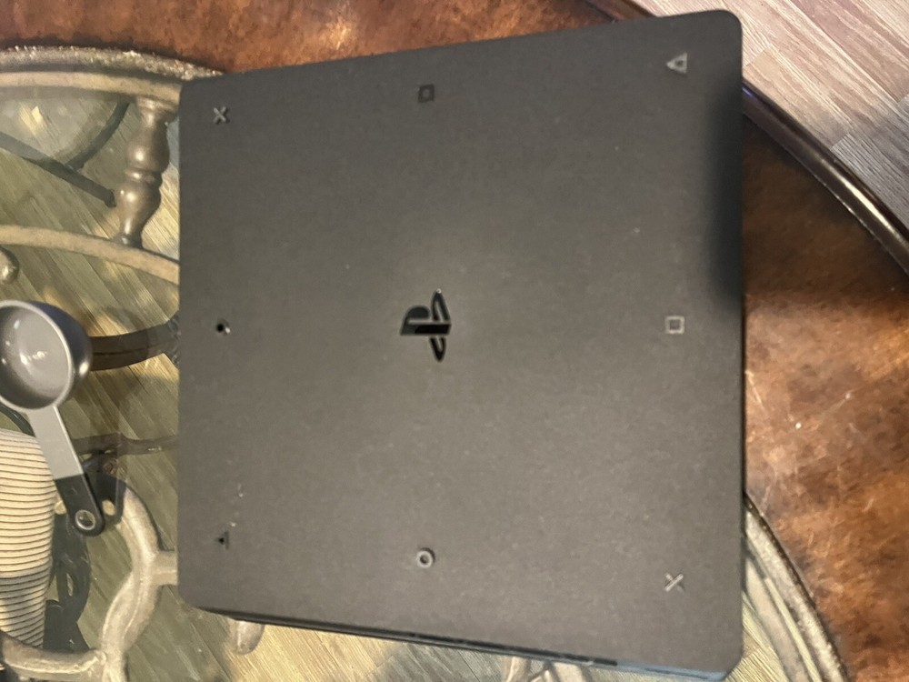 Sony PlayStation 4 Slim 500GB Home Console - Black and 2 PS4 Remotes