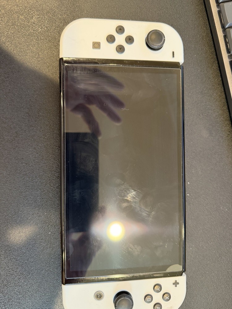 Nintendo Switch OLED Model with Mario Deluxe, 128GB Storage & Extras