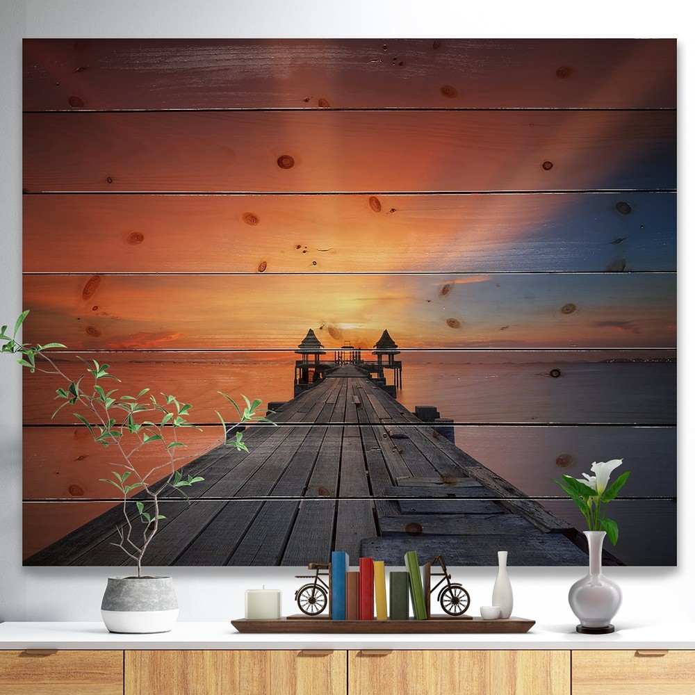 Designart 'Wooden Bridge Under Illuminated Sky' Nautical & Coastal Wood Wall