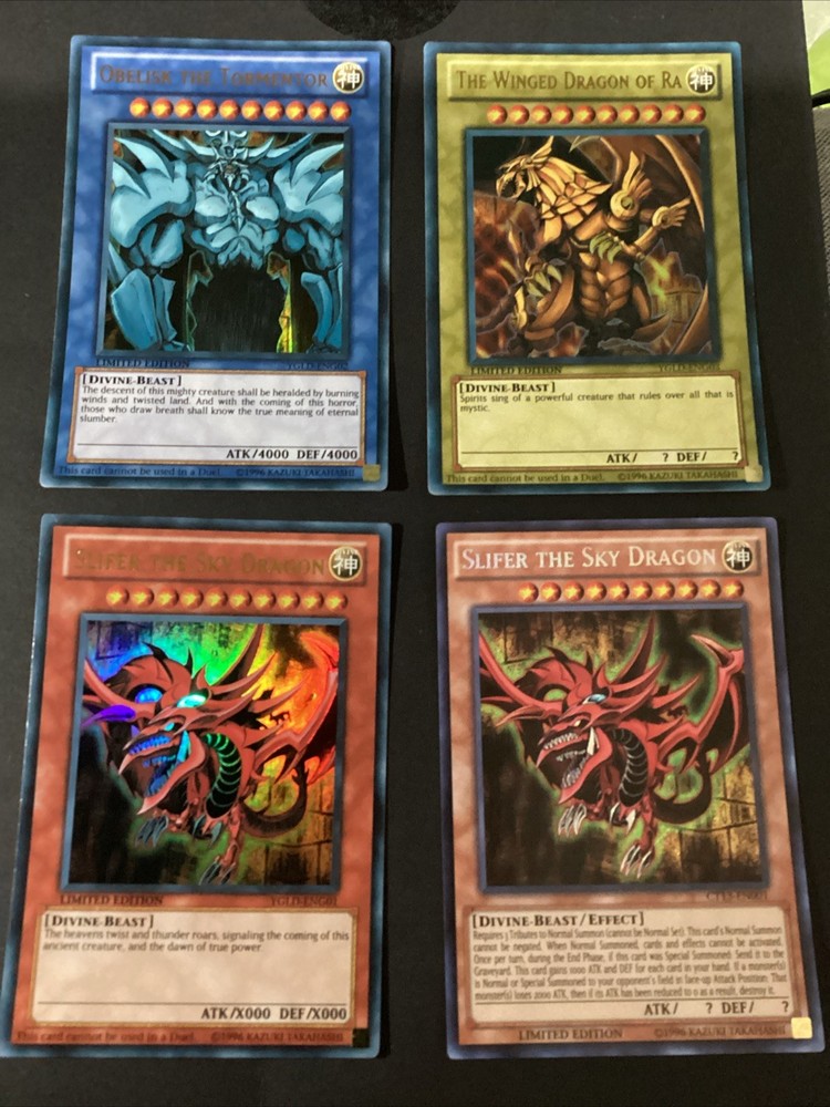 Egyptian God Cards 4-Piece Lot Includes 2 Slifer Obelisk and Winged Dragon