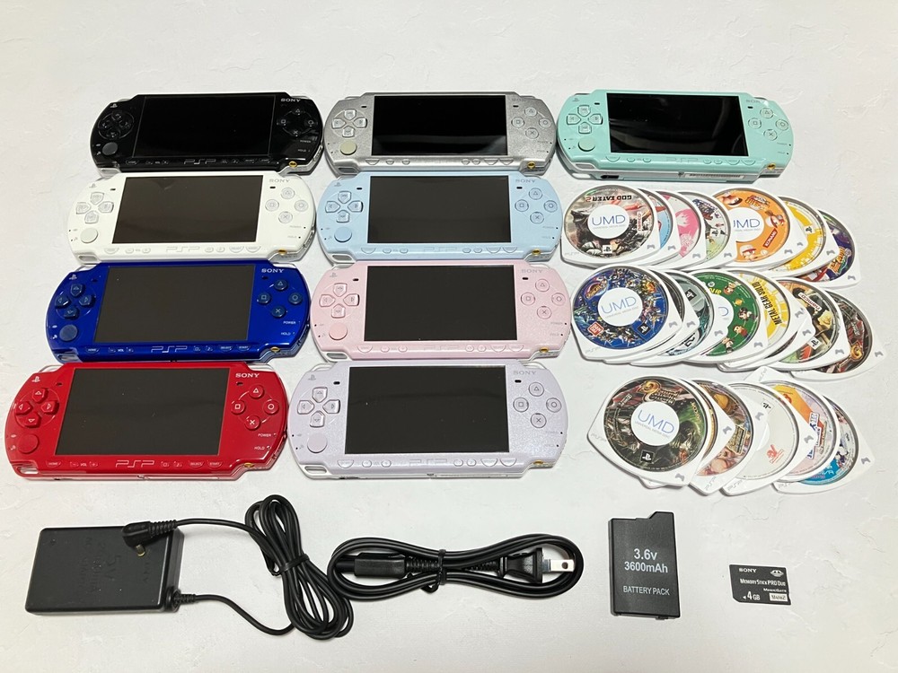 Sony PSP-2000 Console with Battery Charger Memory Stick 3 Random Games