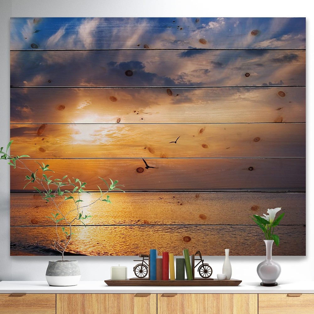 Designart 'West Cost Sunrise Over The seas' Landscapes Sea &  Small