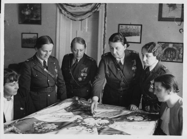 Volunteer female ambulance drivers during World War II take part i- Old Photo