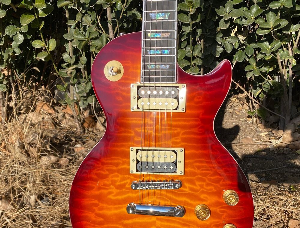 Les Paul electric guitar brown quilted maple veneer Abalone inlaid fingerboard