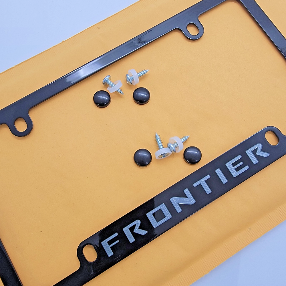 Nissan Frontier Engraved Black Metal License Plate Frame 50 State Licensed