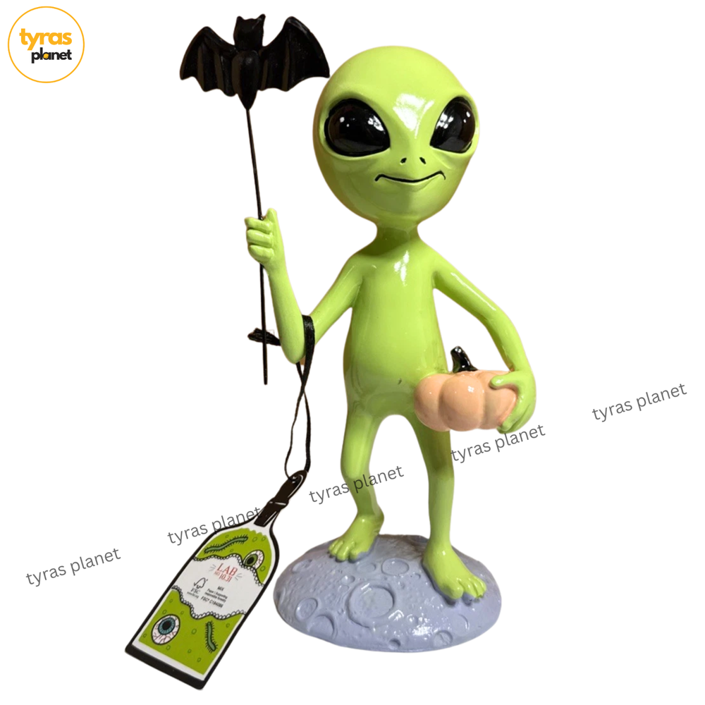 Halloween Green Alien Figurine with Pumpkin and Bat on Moon Base