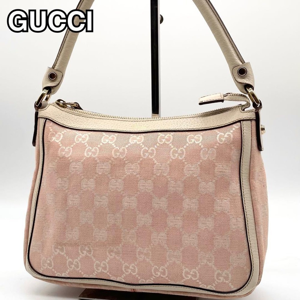 Gucci GG canvas leather pink accessory pouch in excellent condition