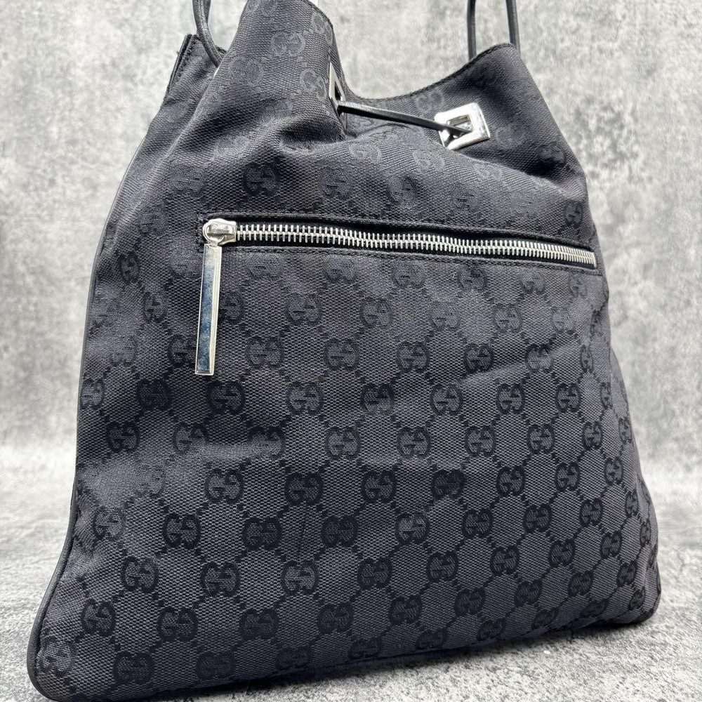 Gucci GG Black Leather Canvas Drawstring Shoulder Bag Authentic Pre-Owned