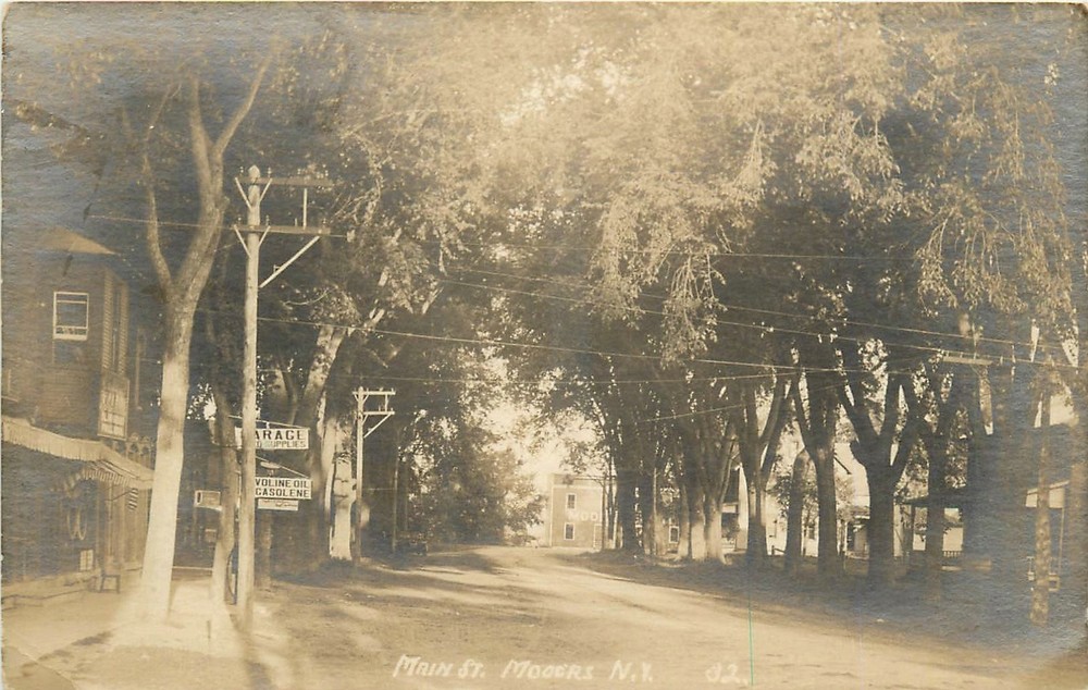 c1910 Mooers New York Garage Gasoline Main Street RPPC Postcard 25-10619