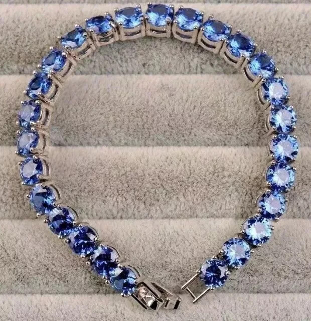 14K White Gold Plated Sapphire Tennis Bracelet with 15 Round Lab-Grown Stones