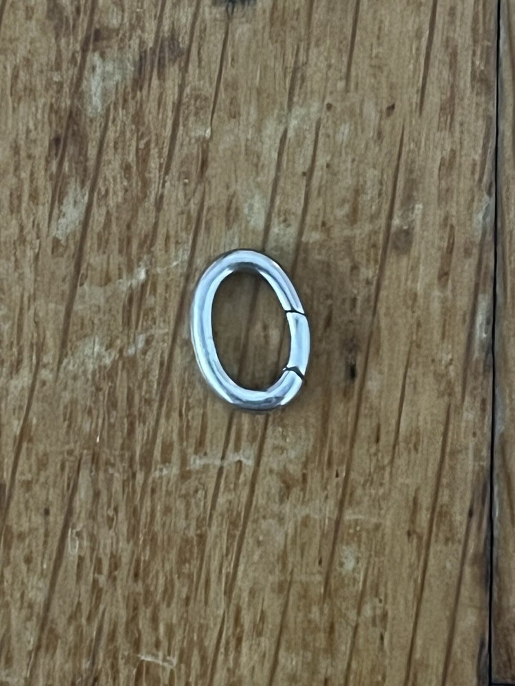 TIFFANY & CO. STERLING SILVER CLASPING RING