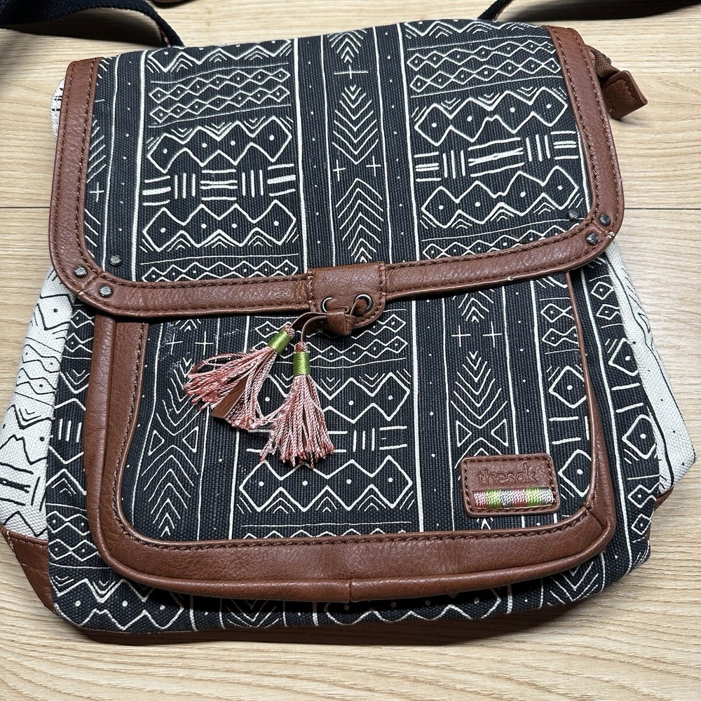 The Sak Pacifica Happy & Free Convertible Crossbody Backpack in Black & White Canvas