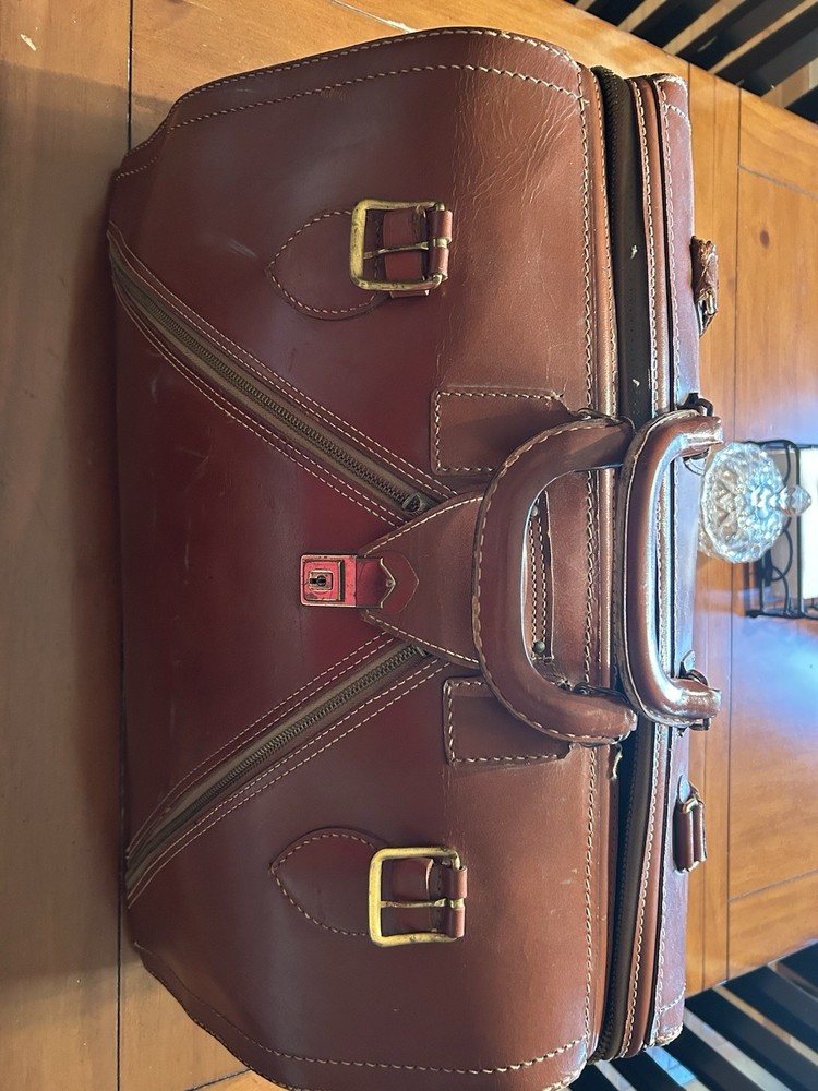 Large Leather Sales Case. Often Used As Overnight Bag Or Carry On.