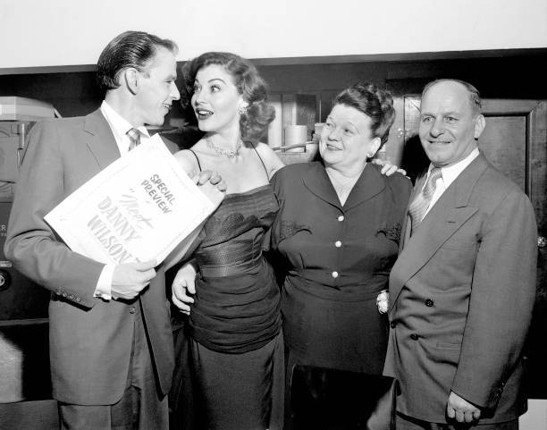 Frank Sinatra and wife Ava Gardner with his parents at opening of  .. Old Photo