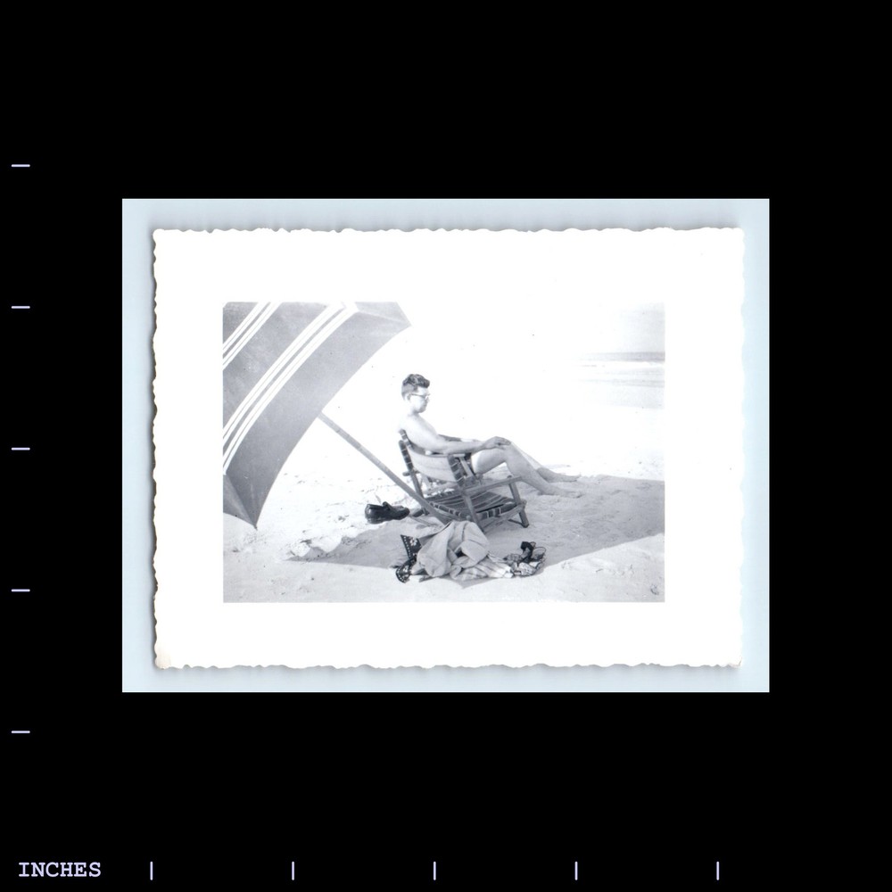 Vintage Beach Scene Man Sunbathing Under Umbrella Retro Photo