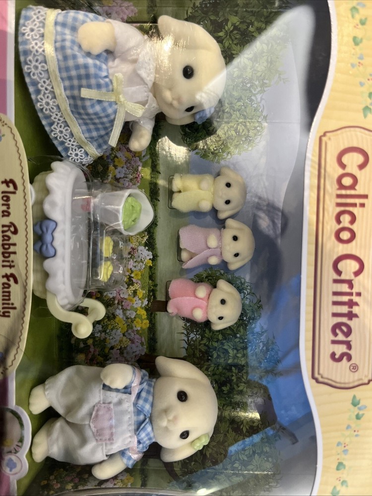 Flora Family Calico Critter  ( Comes With Baby, Dad , Bassinet, Original Box)