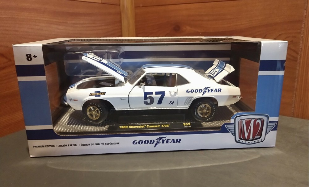 BRAND NEW M2 1969 CHEVROLET CAMARO Z/28 GOOD YEAR 1/24 DIE-CAST W/DISPLAY STAND-image