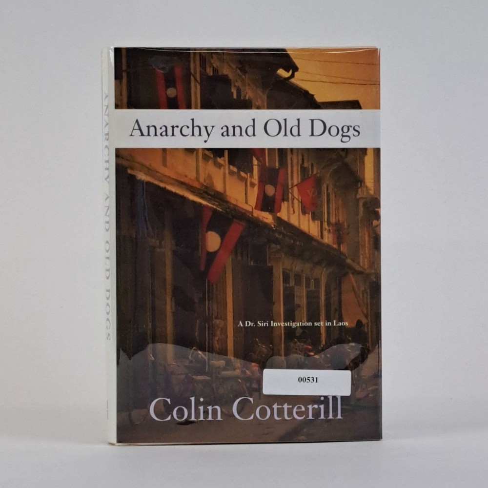 Colin Cotterill / ANARCHY AND OLD DOGS Signed 1st Edition 2007