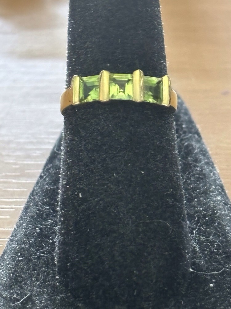 14k yellow gold and peridots ring,size 7, $295.00