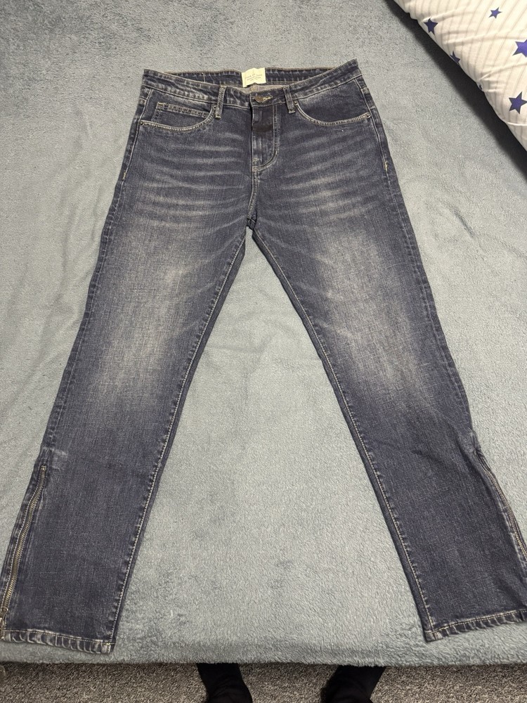 Fear of God Essential Distressed Denim Jeans