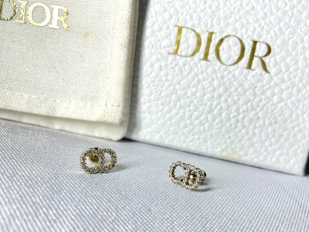 Dior Clair de Lune CD pierced earrings in gold with rhinestones