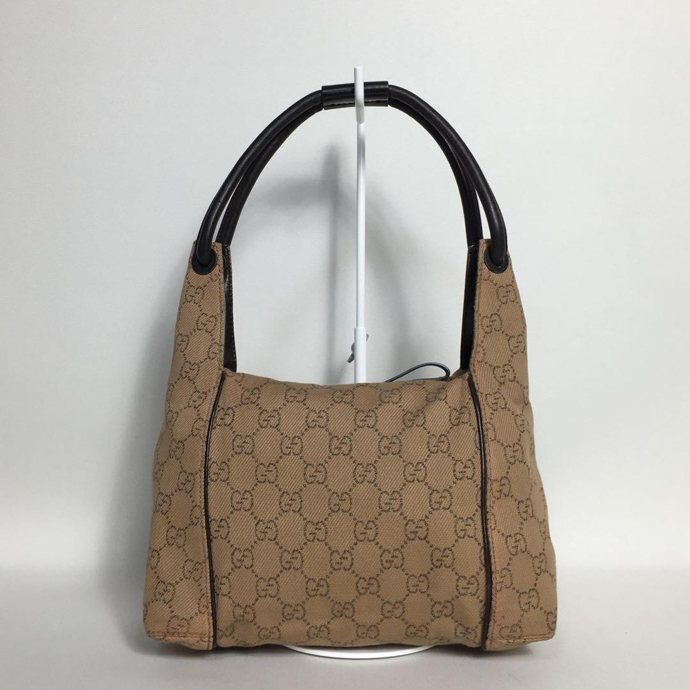 Authentic Gucci GG Canvas Shoulder Bag in Beige