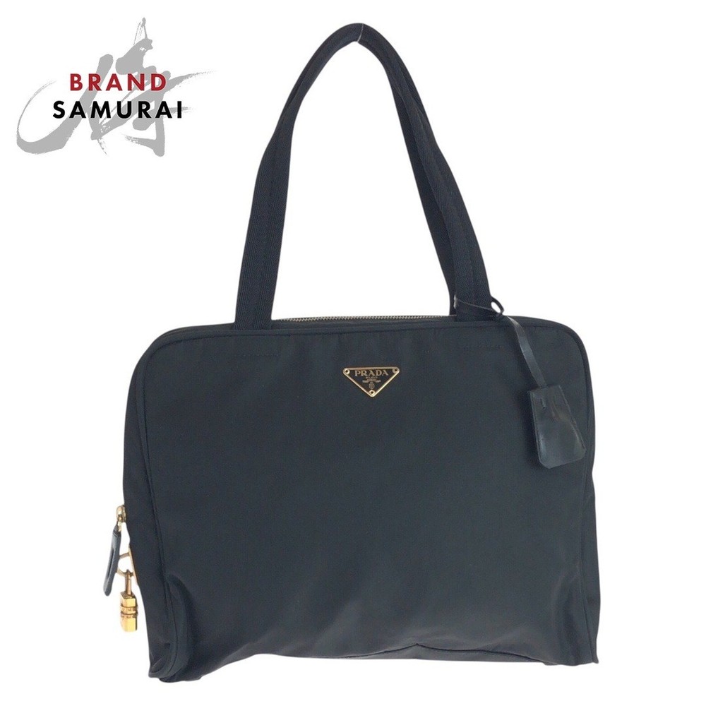 RARE PRADA Tessuto Triangle Logo Black Gold Hard Case Excellent Condition