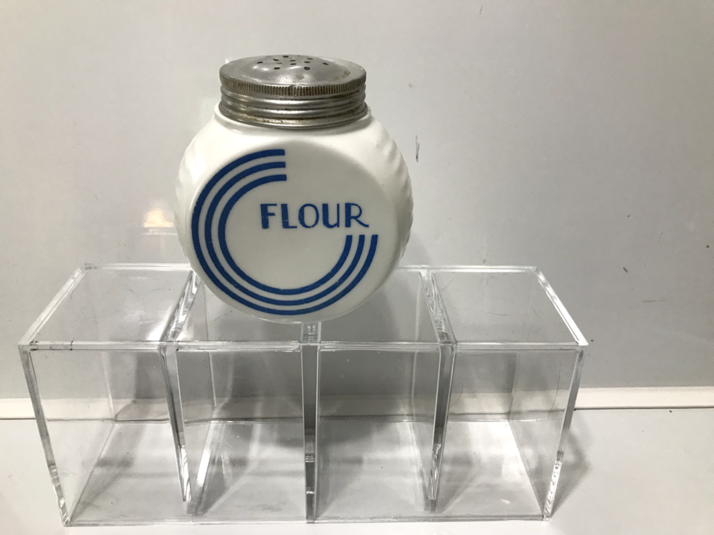 1940s blue and white flour shaker with circle design, original painted lid