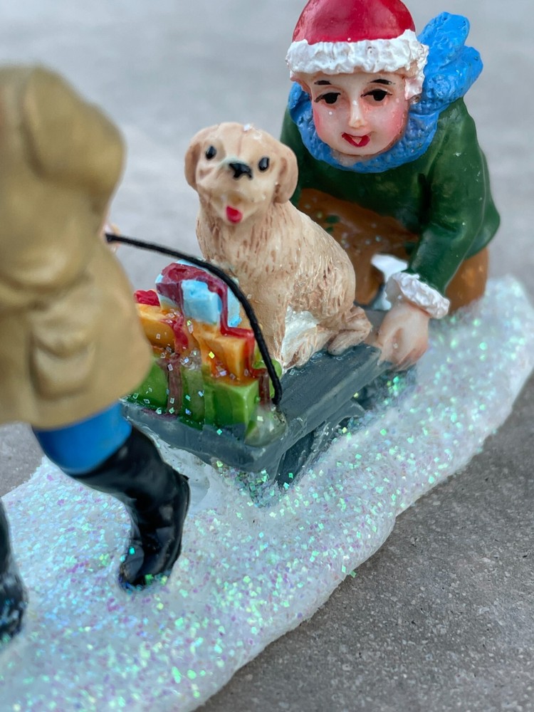 St Nicholas Square Holiday Puppy Joy Ride Christmas Dog Figurine New in Package