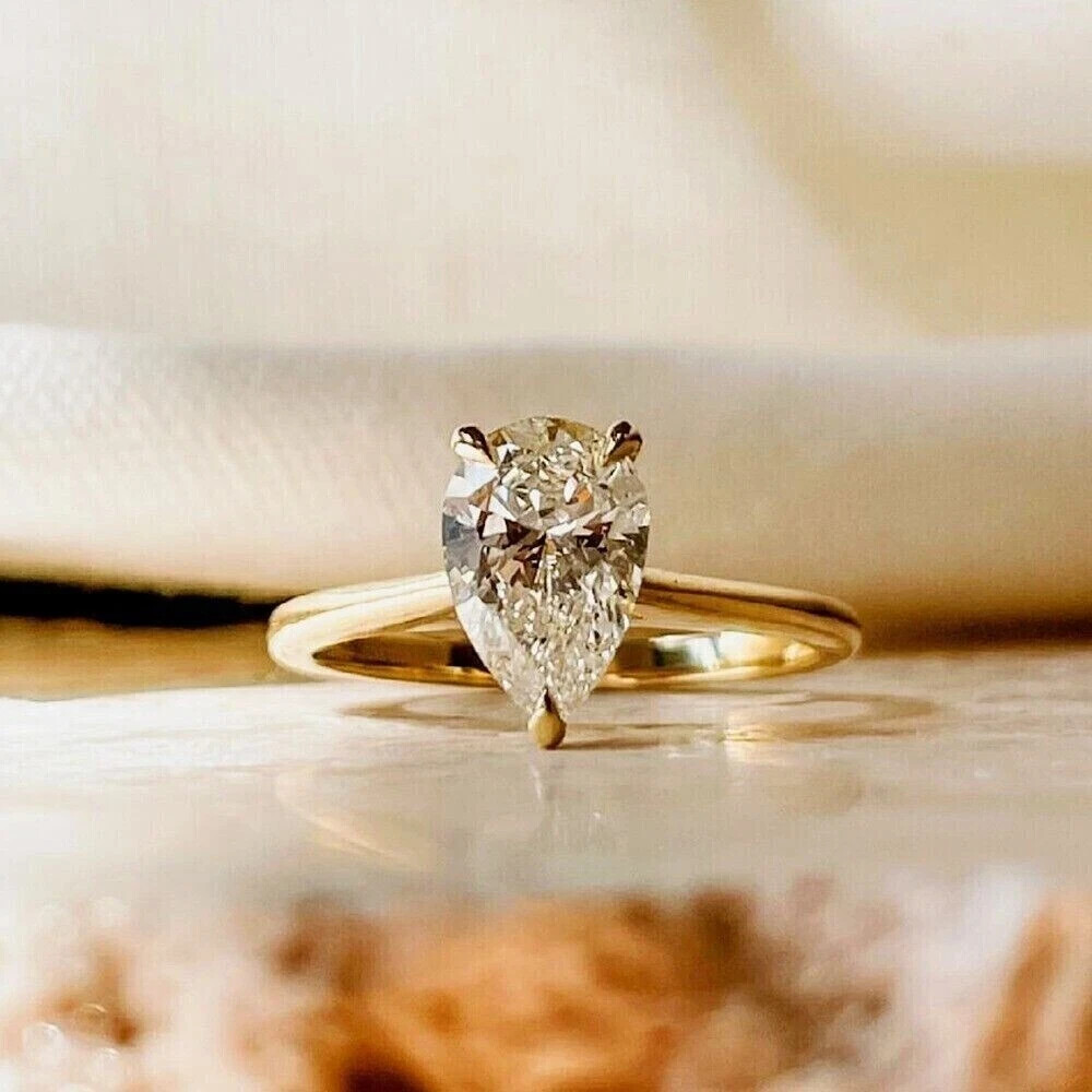 2Ct Pear Cut Moissanite Engagement Ring in 14k Yellow Gold