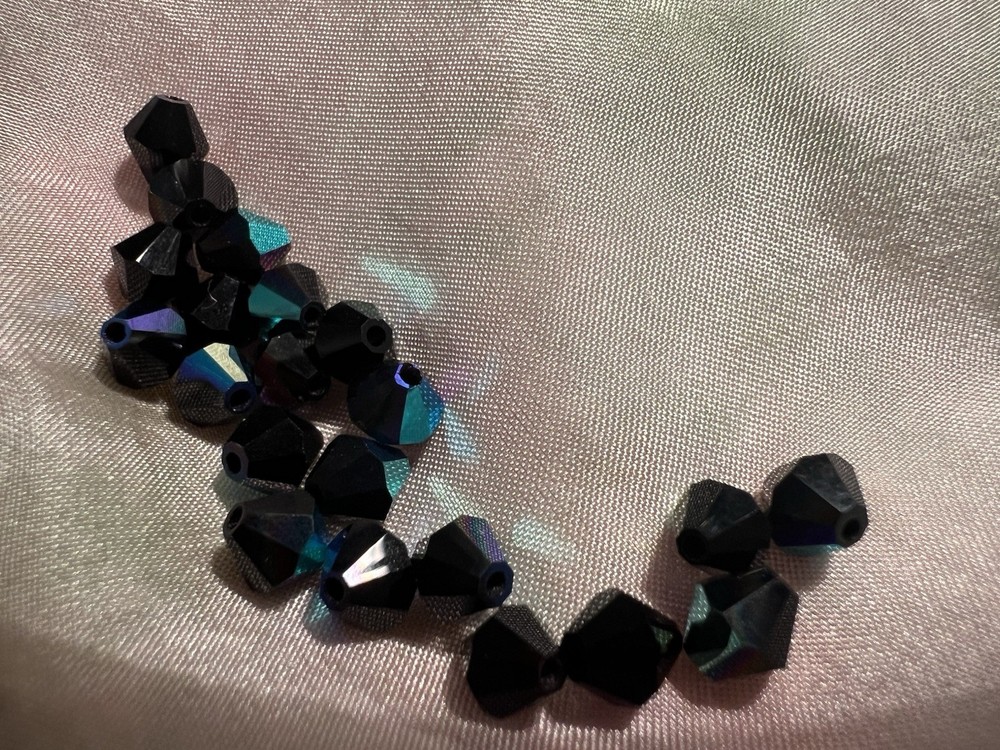 ￼ Swarovski Faceted Beads. 5mm Bicone. First Quality. Jet AB Color