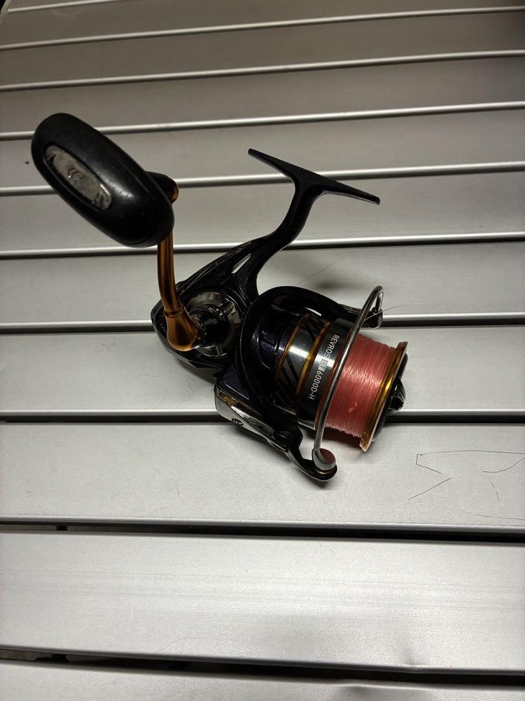 Daiwa Rebros LT6000D-H Spinning Reel with 200m Nylon Line Used Like New