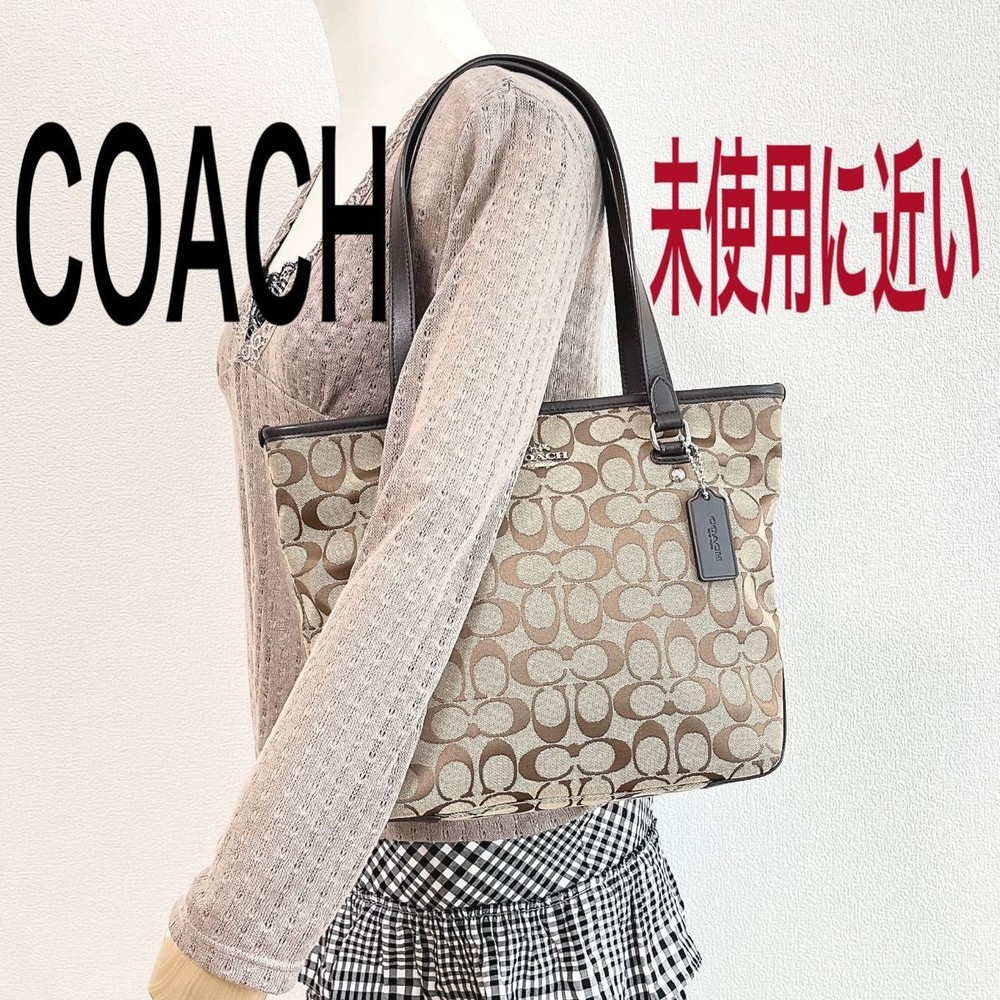 COACH Signature Canvas and Leather Brown Tote Shoulder Bag with Charm