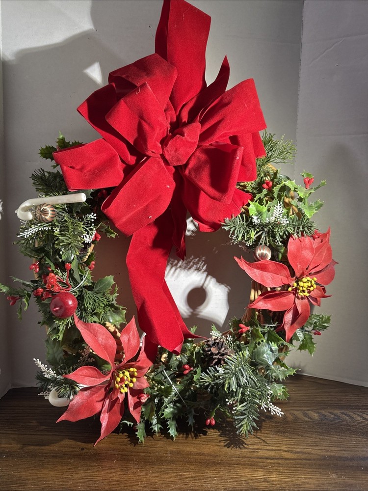 Festive Woven Christmas Wreath with Red Bow and Holly