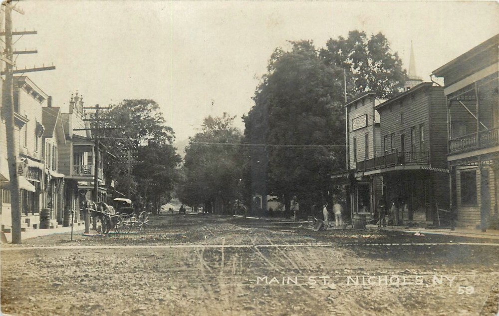 1907 Nichols New York Tioga Main Street people RPPC Postcard 25-6515