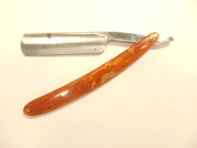 pre-owned straight razor;  brown plastic handle marked 