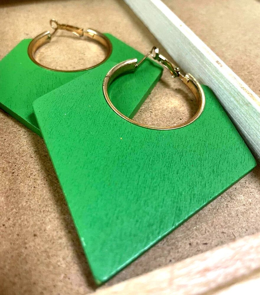 Wooden green hoop earrings for bold, adventurous fashion