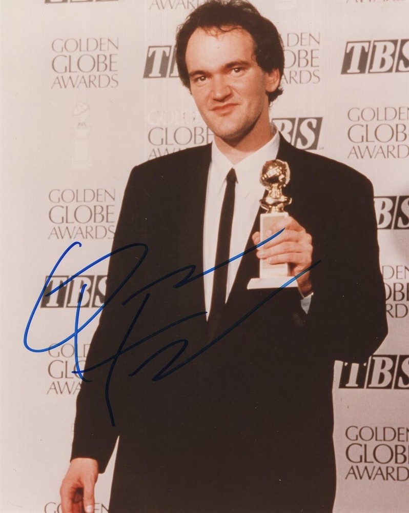 8x10 Color photograph signed in blue felt tip ink by Quentin Tarantino. WITH COA