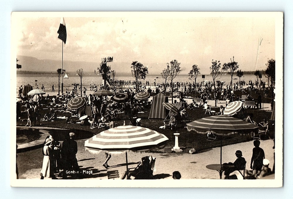 Vintage Geneve RPPC Postcard Beach Scene Striped Umbrellas Sail Boats Ocean
