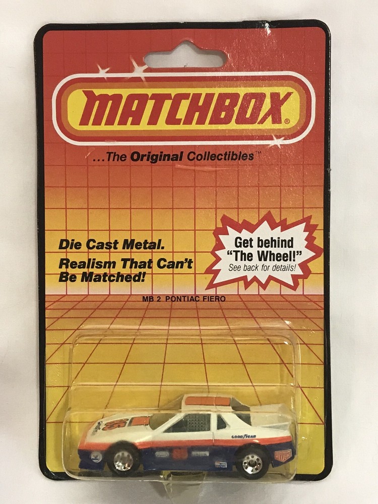 VINTAGE NIB 1983 MATCHBOX MB 2 PONTIAC FIERO 85 GOOD YEAR NEW ON CARD RARE-image
