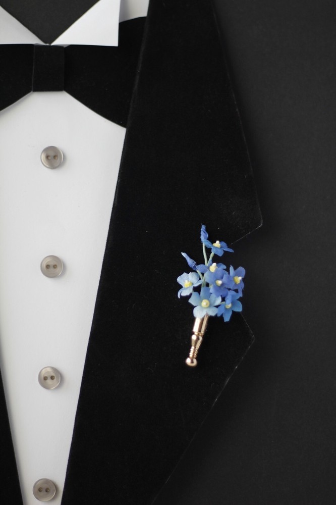 Poirot-inspired blue forget-me-nots lapel pin with tussie mussie vase