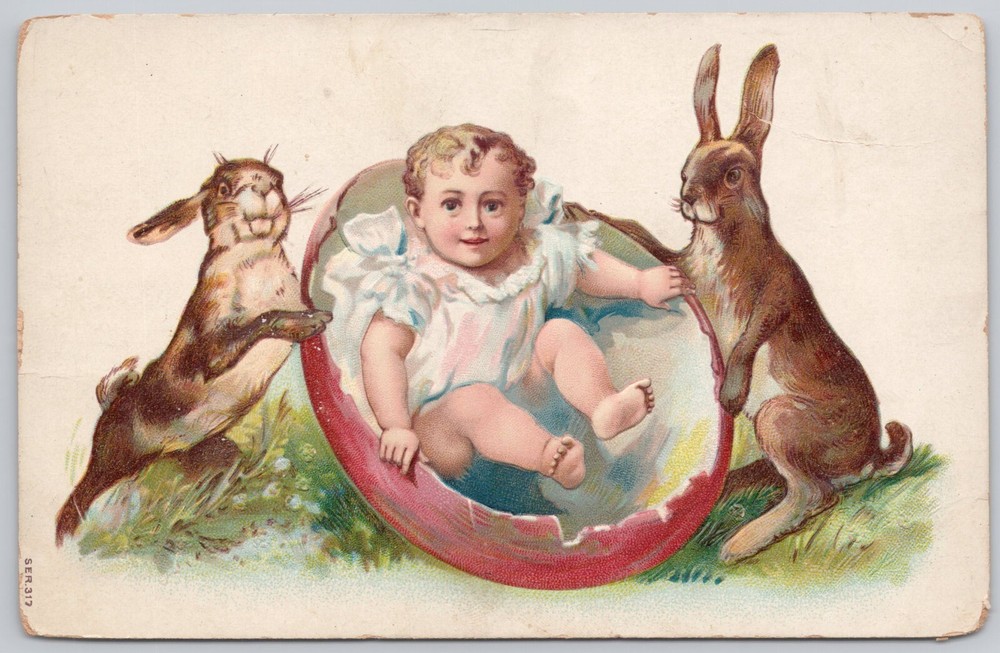 Easter Greetings Divided Back Embossed Postcard Child in Giant Egg Rabbit