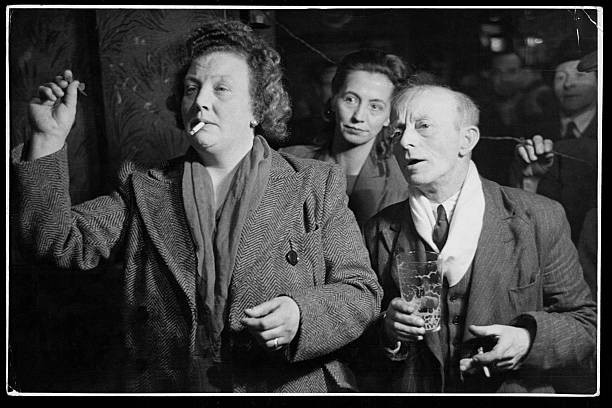 Regulars at The Crown pub in Blackfriars Road take part in a darts- Old Photo